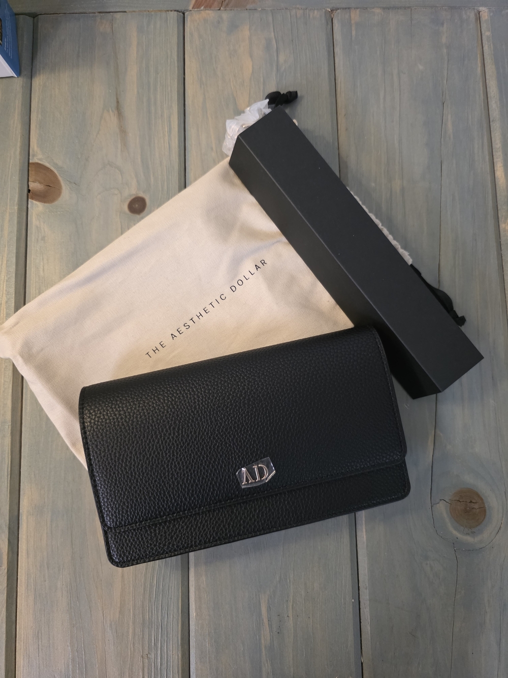 Black Pebbled Leather Clutch with Silver Logo